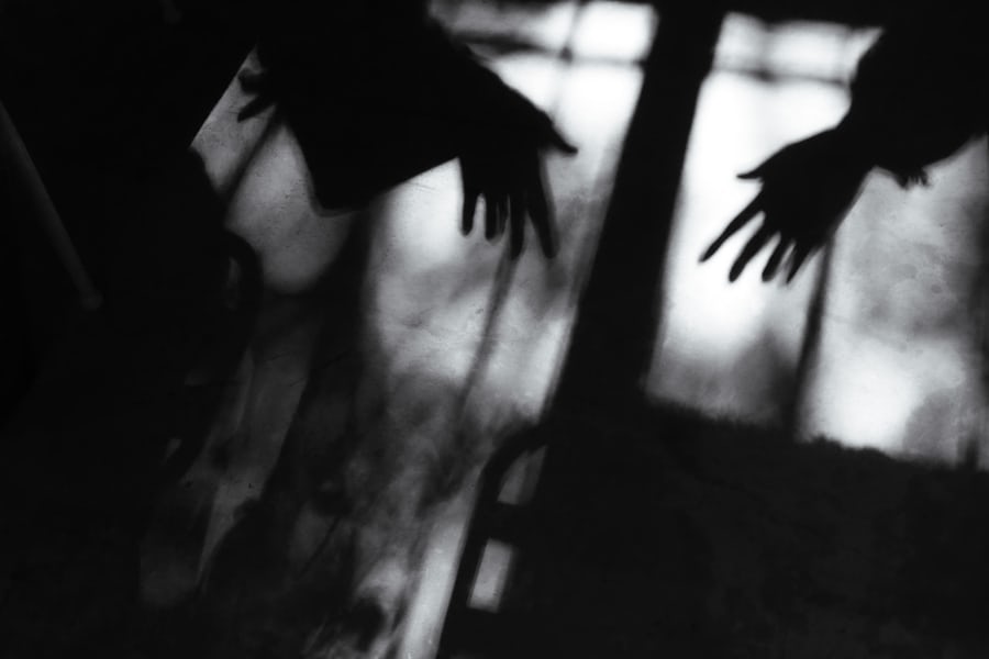 Soft shadows of hands in window light